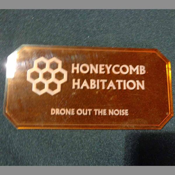 Sign J (Honeycomb Habitation) with stand 1